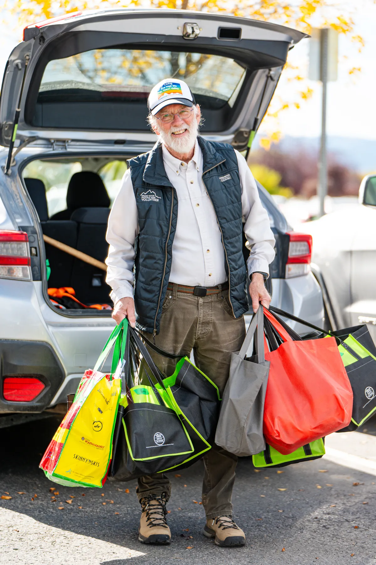 Volunteer delivering meals to homebound seniors through a competitive grant program in Teton Valley